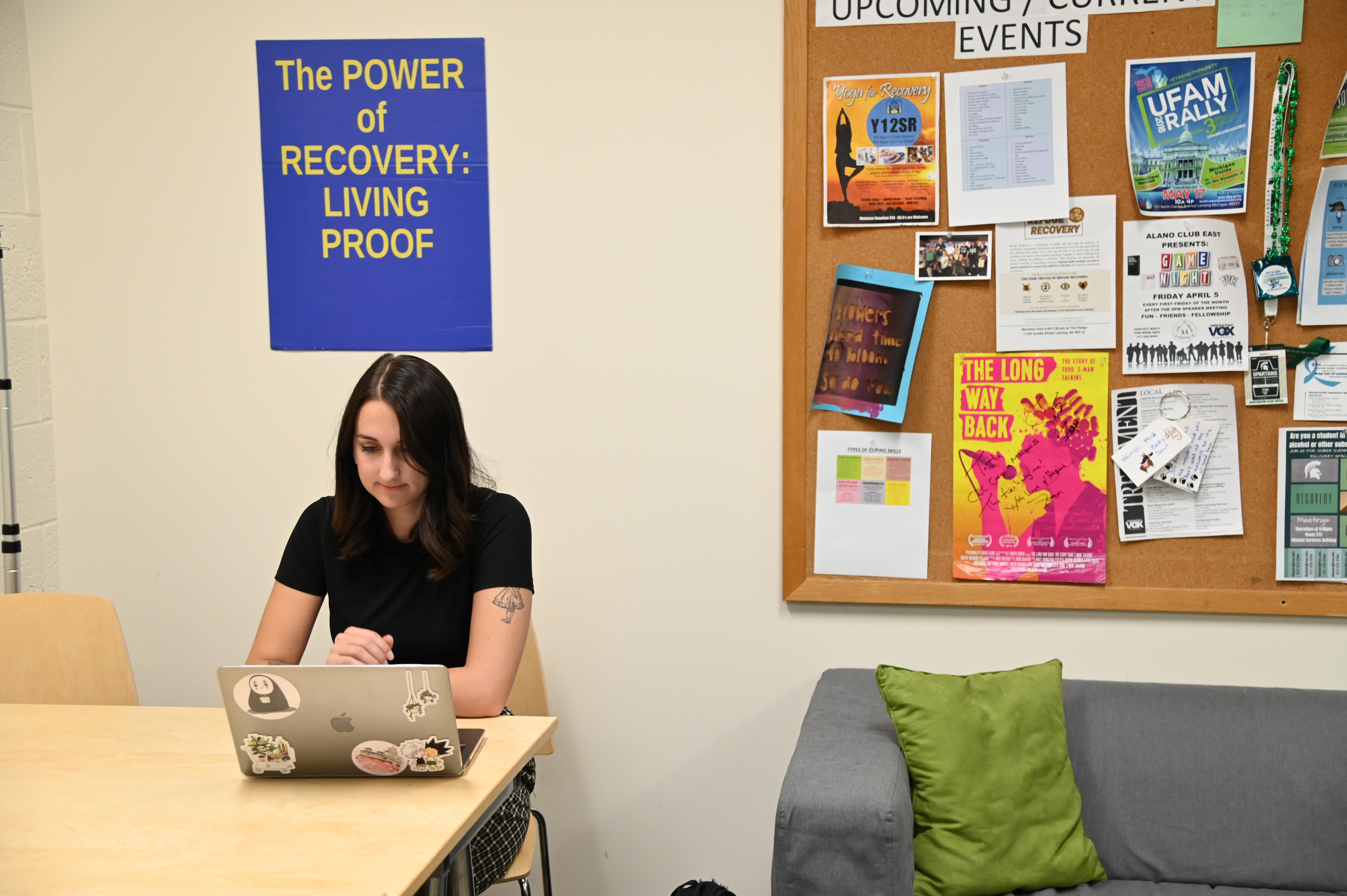 An MSU student studies in the Collegiate Recovery Community lounge.